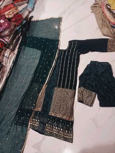 Elegant Teal Kurta Set with Gold Embellishments