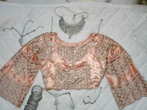 Stunning Peach Embroidered Lehenga Choli