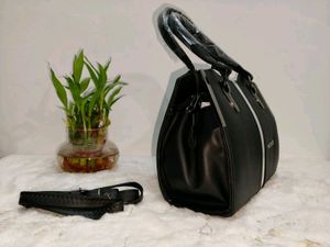 Chic Black Handbag with Silver Accent