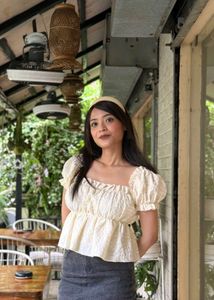 Cream Textured Peplum Top