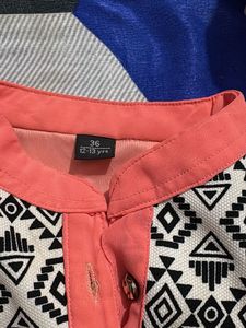 Coral Top with Geometric Print Yoke