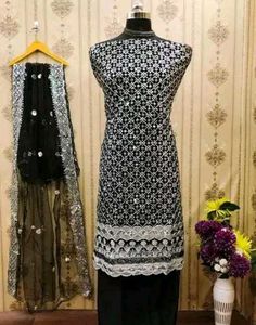 A timeless look with embroidery black dress