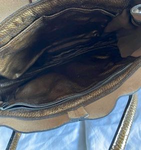 Tod's (Authentic)Camel Leather.