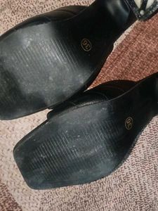 Chic Black Mules with Gold Accent