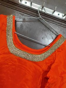 get free green paranda Orange Salwar Kameez