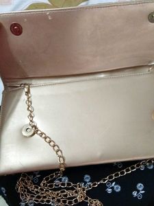 Elegant Gold Clutch with Chain
