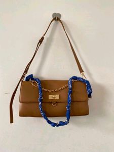 Chic Brown Shoulder Bag with Scarf Accent