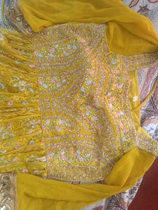 Nyra cutYellow Embroidered kurta Choli Set