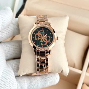 Guess Women's Rose Gold Tone Watch