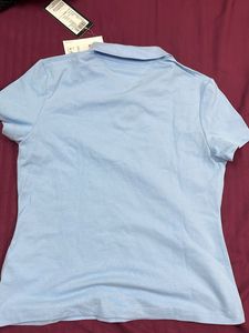 ‼️BRAND NEW TOMMY HILFIGER‼️ Light Blue Polo Shirt