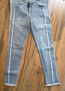 Light Wash Distressed Denim Jeans