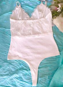 Elegant White Lace Bodysuit