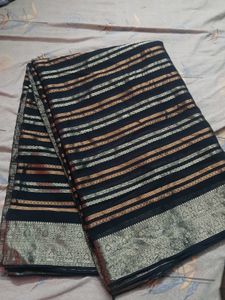 Elegant Black Saree with copper and silver Accents