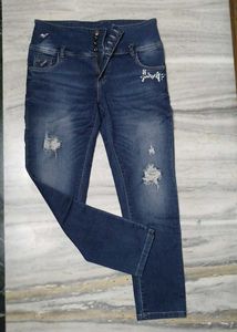 Distressed High-Waisted Denim Jeans