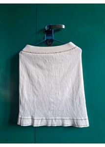 Elegant White Knit Top with Embellished Neckline