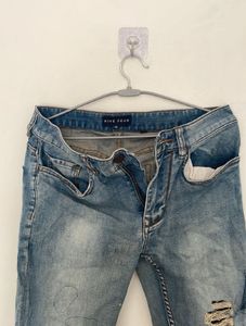 Distressed Blue Jeans