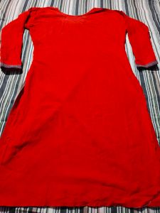 Vibrant Red Kurta with Intricate Neckline