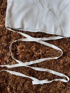 light blue tie-around waist top