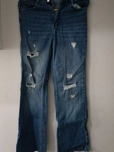 Distressed Blue Denim Jeans