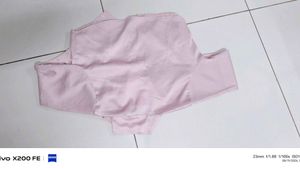 it's a peach pink colour full sleeve, crop shirt