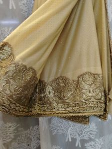 Elegant Golden Embroidered Saree