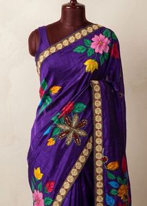 Vibrant Purple Saree with Floral Embellishments
