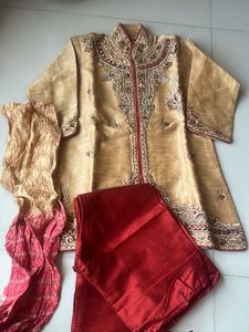 Elegant Gold Sherwani Set with Red Trousers & Dupa