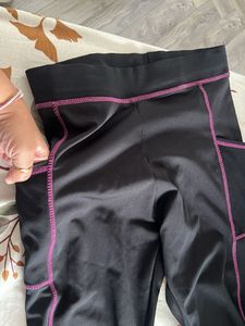 Black gym capri with Purple Stitching