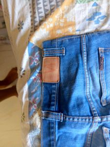 Distressed Blue Denim Jeans