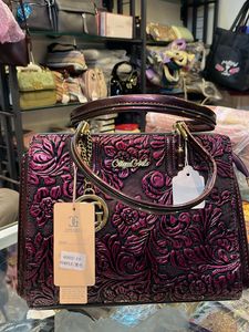 Elegant Embossed Purple Handbag