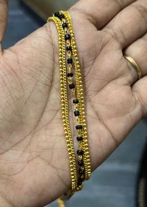 Elegant Gold mangal sutra with Black Beads