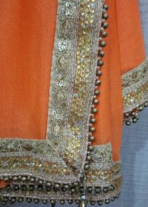 Sparkling Orange Saree with Golden Border ✨
