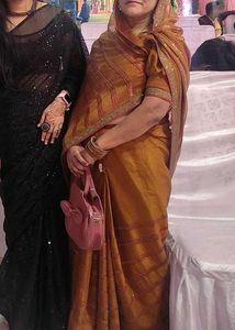 Elegant mustard heavy party wear saree with blouse