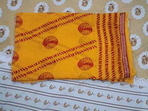 Vibrant Yellow Saree with Red Bandhani Print