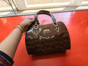 Chic Brown Patent Leather Handbag