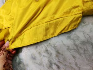 Yellow gown with heavy work