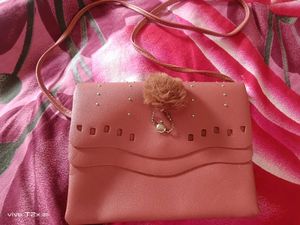 Stylish Pink Clutch with Pom-Pom
