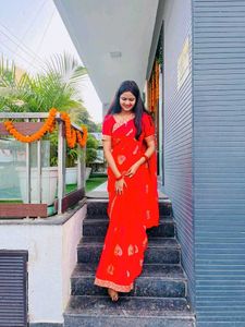 Vibrant Red Saree with Golden Motifs