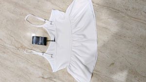 White Peplum Camisole Top