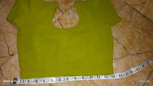 It's a Green coloured saree with blouse