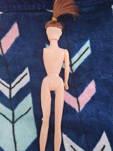 Doll with missing arm