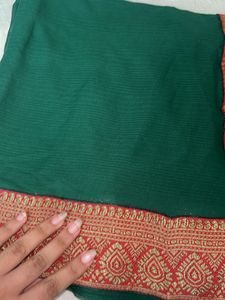 Elegant Green Saree with Red Border