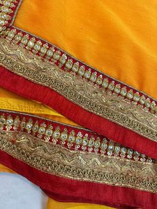 Vibrant Orange Saree with Brocade Blouse