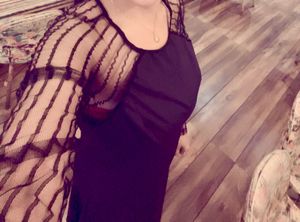 Elegant sheer with net panel evening gown