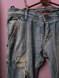 Distressed Light Wash Denim Jeans
