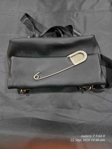 Daze Black Faux Leather Crossbody Bag with big saf