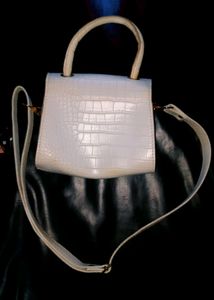 white bag sling