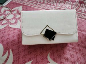 26.Chic White Clutch with Gold Chain