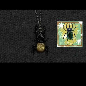 Whimsy Handmade pendant.