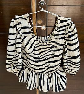 Zebra Print Smocked Peplum Top